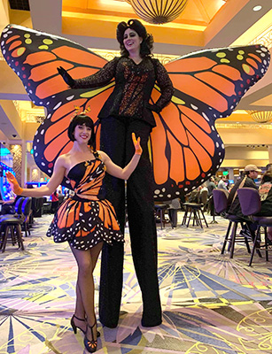 Butterfly stilt walker and candy girl